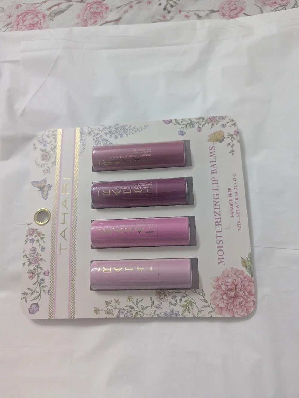 Tahari Lip Balm Quartet — Light Pink, Medium Pink, Mauve, Plum